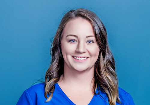 a woman in blue shirt